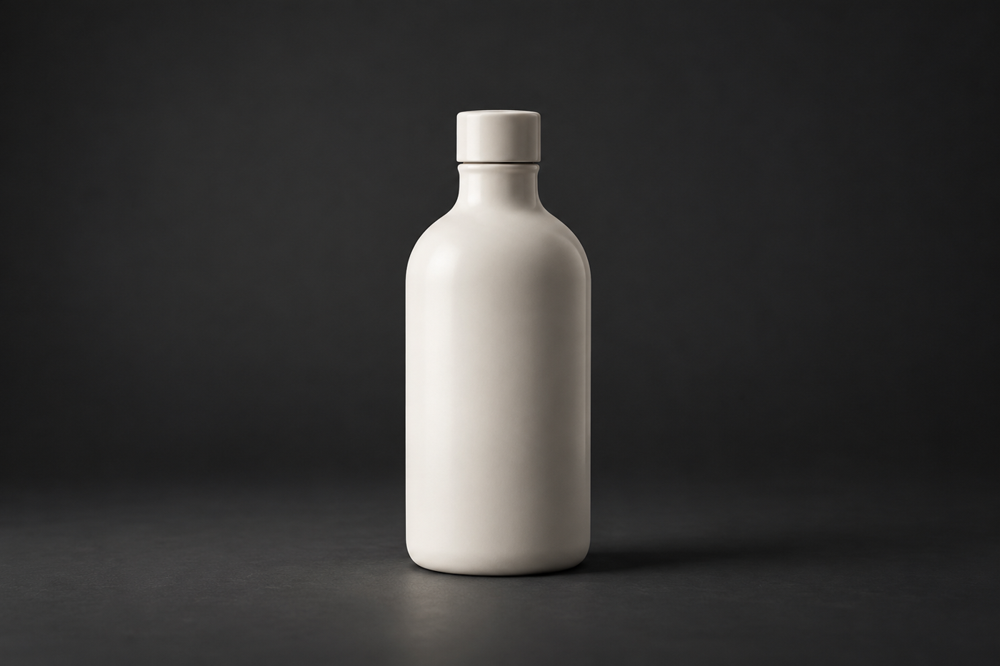 Product Photography Backgrounds: A Practical Guide 3 Pale ceramic bottle silhouette clearly separated from a charcoal background
